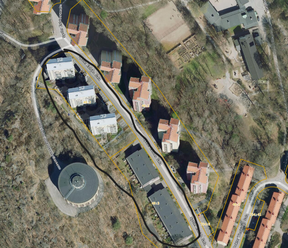 Drönarbild över Guldheden, där man ringat in området där tillståndsparkeringen ligger. 