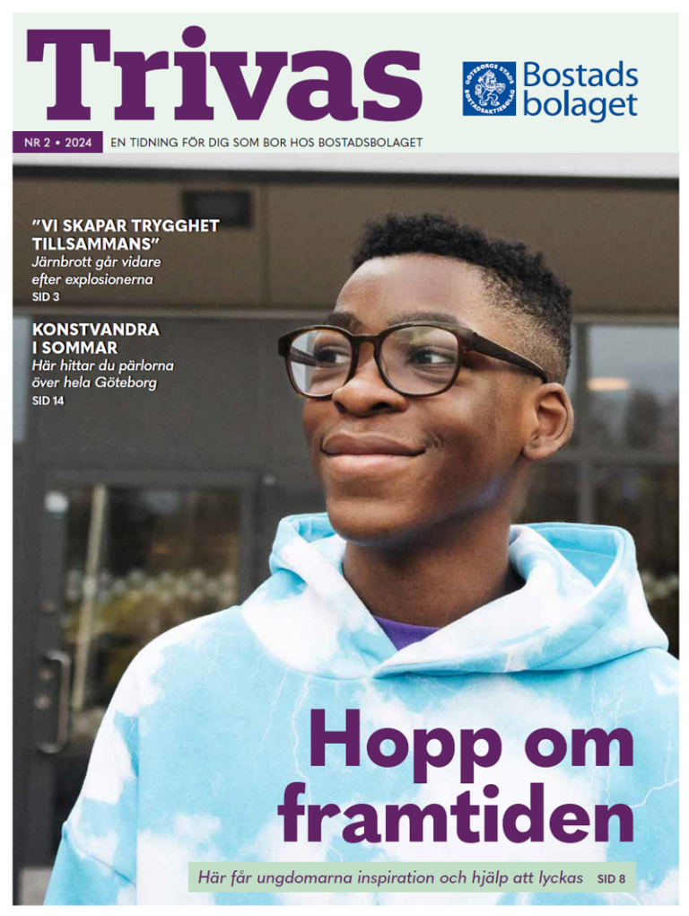 En ung man med glasögon på omslaget till en tidning.