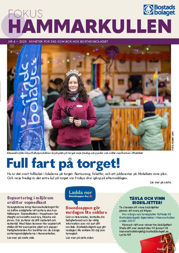 Framsidan av en tidning med en kvinna i röd jacka.