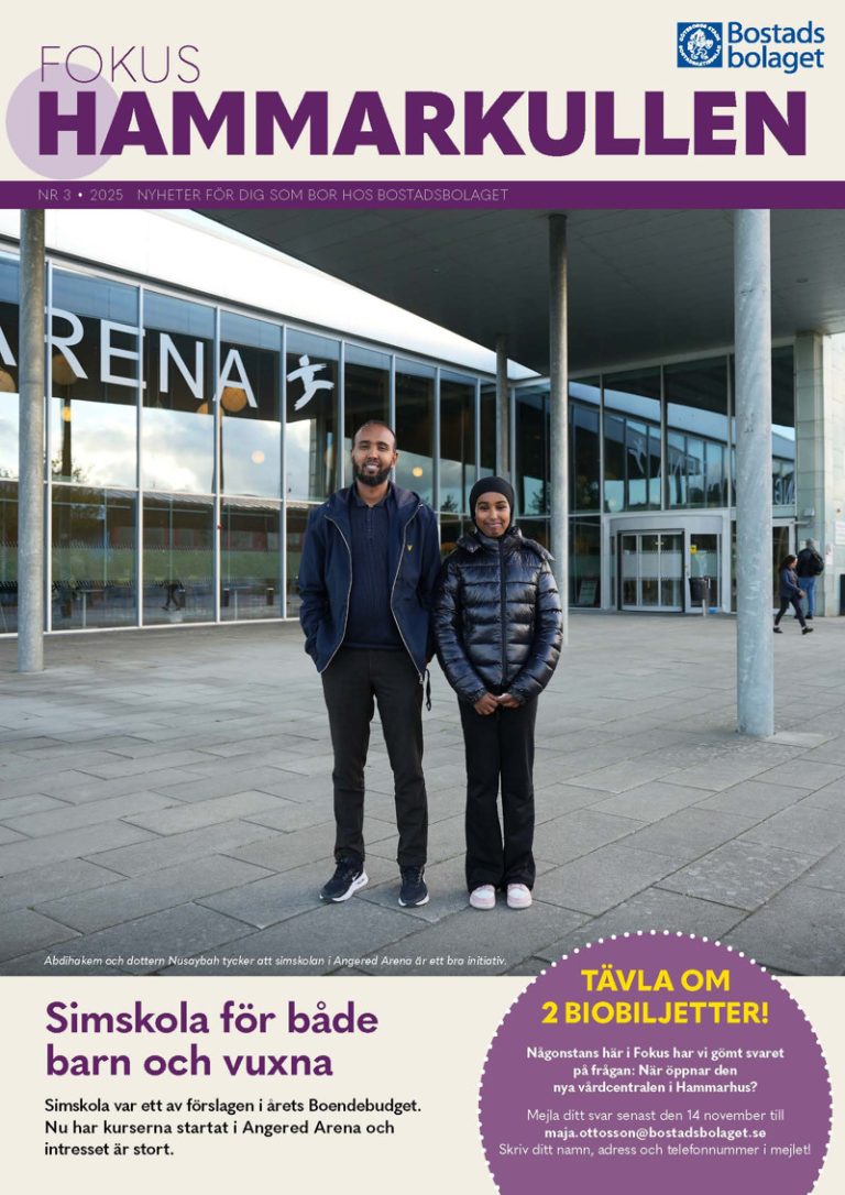 Omslag till en tidning. Två personer som står framför en byggnad.